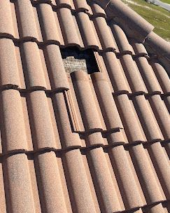 Aerial view of broken roof tiles